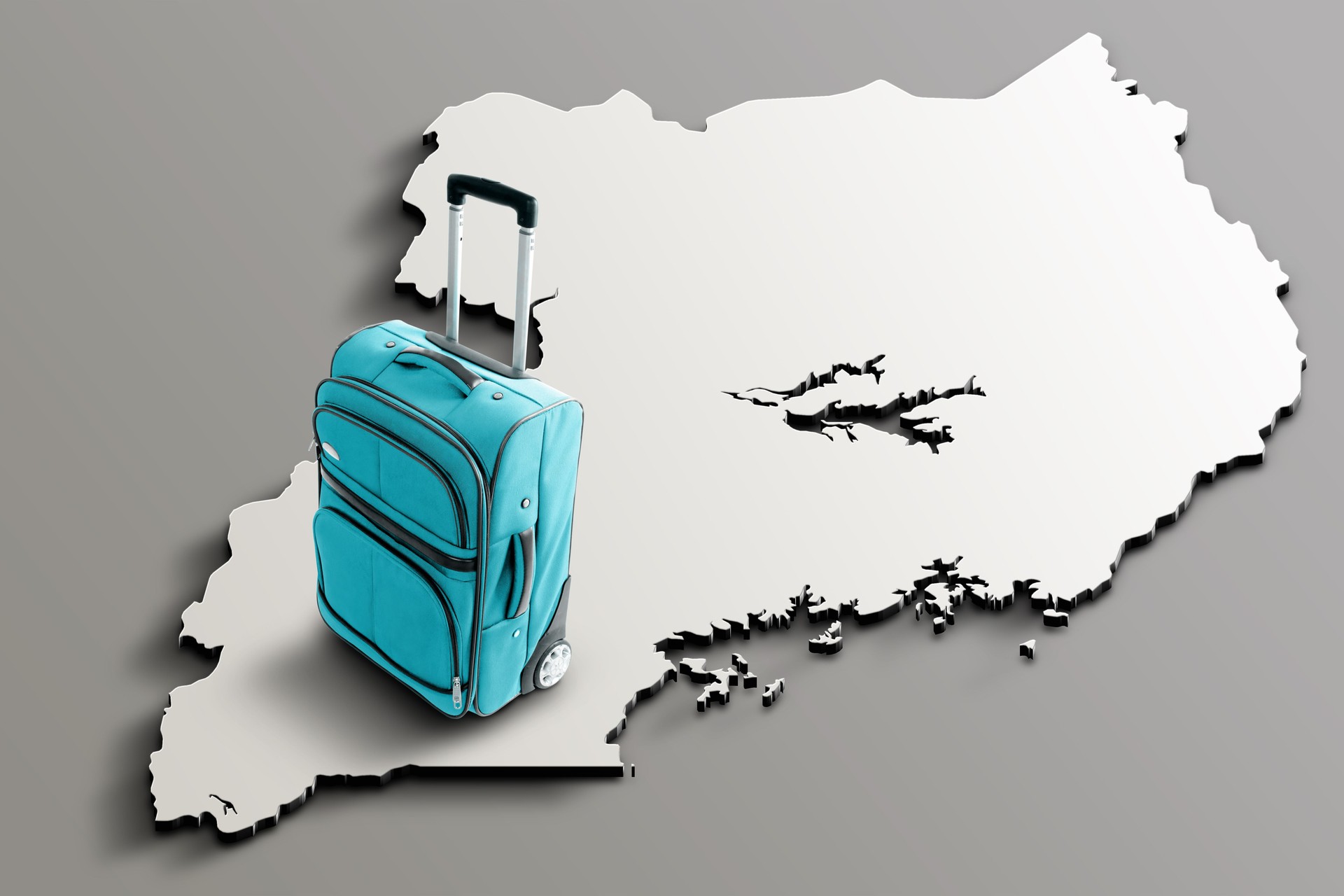Blue suitcase on 3d map of Uganda